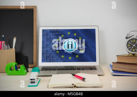 Immagine composita di laptop e vari accessori per ufficio su tavola Foto Stock