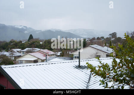 Coperta di neve tetti Foto Stock