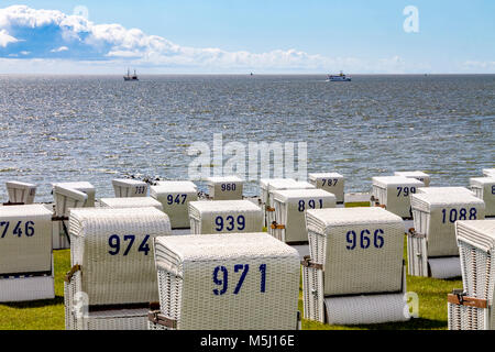 Germania, Schleswig-Holstein, Buesum, spiaggia, incappucciati sdraio in spiaggia Foto Stock