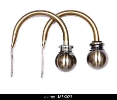 Palla di ottone finestra a tendina coppia holdback isolati su sfondo bianco Foto Stock