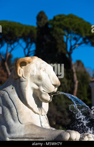 Intorno all'antica obelisco egiziano in Piazza del Popolo (piazza del Popolo) sono quattro egiziano fontane di Lion. Roma. Lazio. L'Italia. Foto Stock