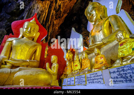 Oltre 8000 piccole e grandi Golden Statue di Buddha vengono collocati in Pindaya Shwe Umin grotta Foto Stock