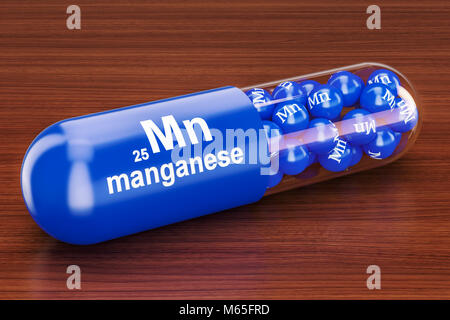 Capsula con manganese Mn elemento sul tavolo di legno. Il rendering 3D Foto Stock