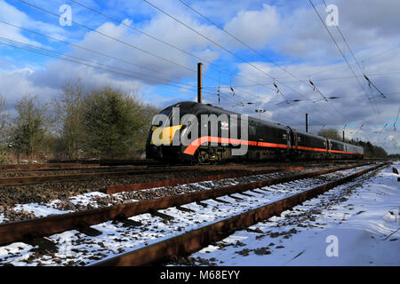 In inverno la neve, 180 classe, Grand Central treni, East Coast Main Line Railway, Peterborough, CAMBRIDGESHIRE, England, Regno Unito Foto Stock