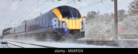 In inverno la neve, 180102 primo scafo treni, East Coast Main Line Railway, Peterborough, CAMBRIDGESHIRE, England, Regno Unito Foto Stock