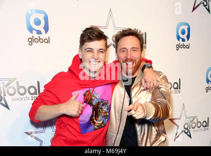 Martin Garrix con il premio per il miglior pop dance e David Guetta in sala stampa al Global Awards, un nuovissimo premi mostra ospitata da Global, Media e Entertainment Group, a Londra, Eventim Apollo Hammersmith. Picture Data: giovedì 1 marzo 2018. Vedere PA storia SHOWBIZ globale. Foto di credito dovrebbe leggere: Isabel Infantes/PA FILO Foto Stock