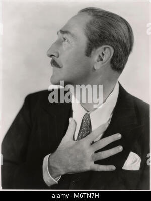 Adolphe Menjou, Ritratto di pubblicità per i film, "ing, Baby cantare', 20th Century Fox, 1936 Foto Stock