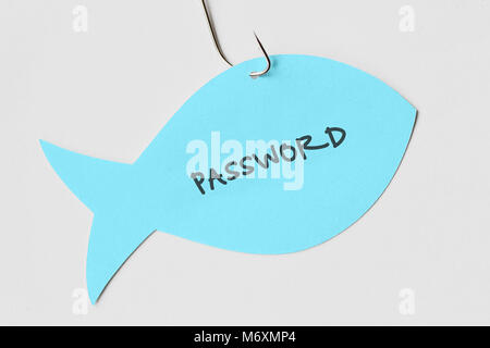 Scrivere la password su un foglietto di carta a forma di pesce attaccato ad un gancio - Phishing e sicurezza internet concept Foto Stock