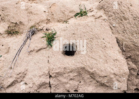 Foro nella roccia Foto Stock