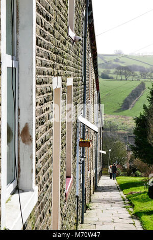 Ripida fila di case a schiera in,COLNE LANCASHIRE, Regno Unito Foto Stock