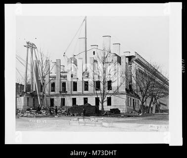 La costruzione dell'edificio del Tesoro degli Stati Uniti a Washington, D.C., che mostra il design architettonico americano dei primi anni del XIX secolo. L'edificio è stato progettato per simboleggiare la forza finanziaria della nazione ed è stato completato negli anni '1830 Foto Stock