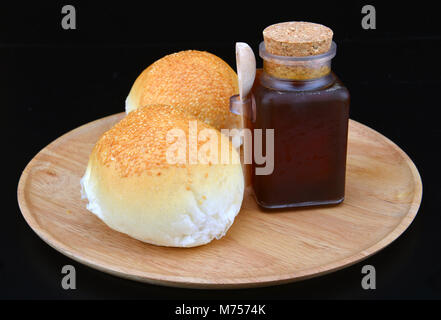 Sticky dolci di miele e pane pronto a serv Foto Stock