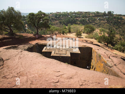 Bet giyorgis (San Giorgio), una chiesa monolitico scolpito nella roccia, Amhara Region, Lalibela, Etiopia Foto Stock