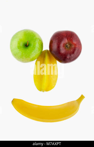 Smiley face composta di frutta Foto Stock