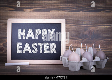Felice Pasqua. Candele a forma di uova di Pasqua. Vacanza astratto e sfondo a molla Foto Stock