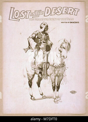"Lost in the Desert", un evento drammatico scritto da Owen Davis, racconta la storia della sopravvivenza e della perseveranza nelle dure condizioni del deserto. Questa produzione è un notevole esempio di teatro americano del XX secolo. Foto Stock