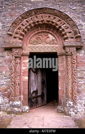 Porta Sud di Kilpeck chiesa parrocchiale di Santa Maria e San Davide, Herefordshire, Inghilterra Foto Stock