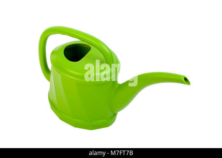 Verde di plastica annaffiatoio su bianco. Foto Stock