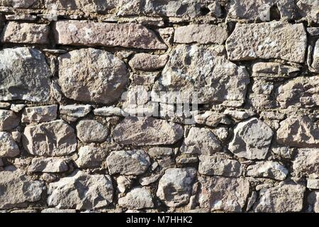 Muro di pietra barriera, ostacolo, difficoltà Foto Stock