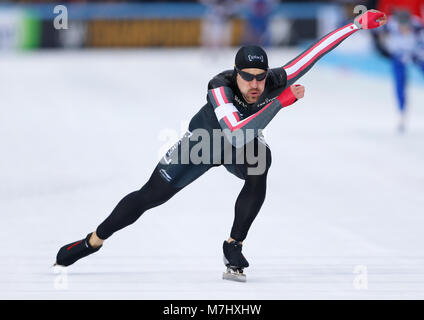 Amsterdam, Paesi Bassi. Decimo Mar, 2018. Denny Morrison del Canada compete durante gli uomini 500m caso di pattinaggio di velocità a ISU WORLD Allround Speed Skating Championships 2018 ad Amsterdam in Olanda, 10 marzo 2018. Morrison ha finito la gara con 37.97 secondi. Credito: Voi Pingfan/Xinhua/Alamy Live News Foto Stock