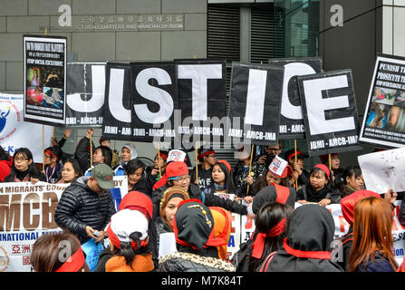 Giustizia per Erwiana protesta da parte di lavoratori migranti di Hong Kong. Esteri lavoratori domestici di Hong Kong per strada marciando al governo centrale Foto Stock