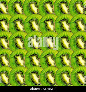 Verde kiwi fette texture, vera e propria foto sfondo alimentare Foto Stock