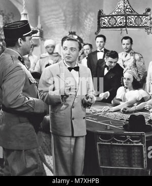 CASABLANCA 1942 Warner Bros film con da sinistra: Claude Rains e Peter Lorre Foto Stock