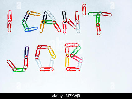 Concetto. Le parole sono disposte su un foglio bianco di carta con clip. Non riesco a lavorare. Foto Stock