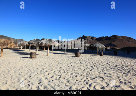 Palapas sulla spiaggia tecolote Foto Stock