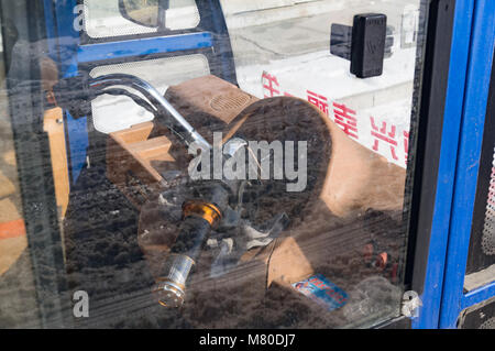 A motore a tre ruote scooter con una cabina Foto Stock