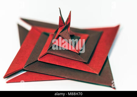 Origami carta piatta poliedro macro closeup Foto Stock