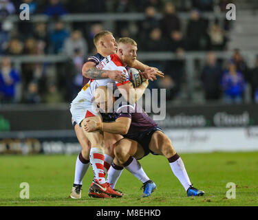 16 marzo 2018, totalmente Wicked Stadium, St Helens,Merseyside, Inghilterra; Betfred Super League Rugby, Round 6, St Helens versus Leeds rinoceronti; Luca Thompson di St Helens è affrontato da Carl Ablett di Leeds rinoceronti e Jack Walker di Leeds Rinoceronti Foto Stock