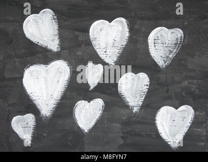 Dipinto a mano in bianco e nero di cuori Foto Stock