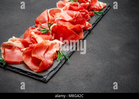 Italian prosciutto crudo o spagnolo jamon Foto Stock