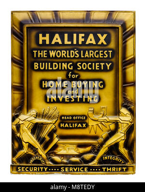 Art Deco / pubblicità promozionale di placca a muro per l'Halifax Building Society (ora parte di Lloyds Banking Group). Foto Stock