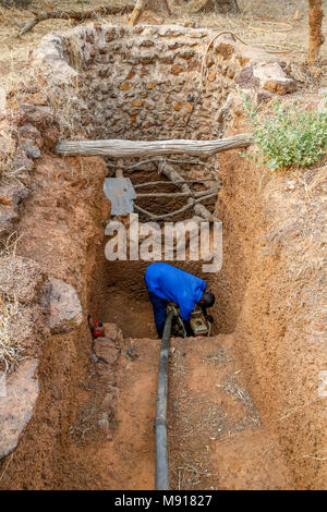 UBTEC ONG in un villaggio nei pressi di Ouahigouya, in Burkina Faso. Foro di irrigazione. Foto Stock