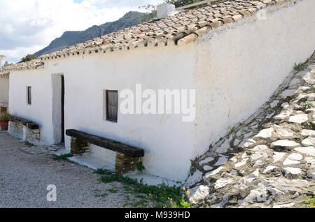 Centro storico di piccole case dipinte di bianco per i lavoratori della tradizione artigianale della calce rendendo nel Museo di calce, moron de la Frontera, Siviglia, Andalus Foto Stock