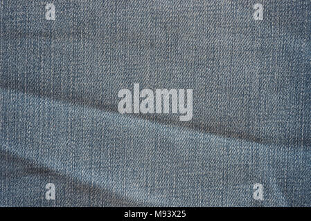 Vecchio weatered blu denim texture di sfondo Foto Stock