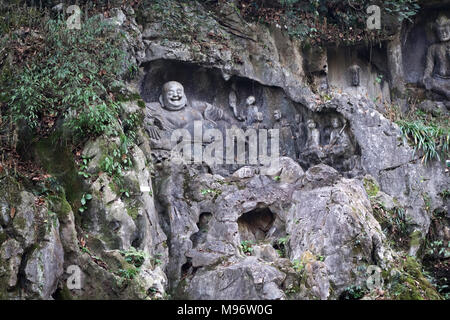 La scultura di ridere Buddha. Si è creduto che toccando lo stomaco scultura porta fortuna e felicità. Foto Stock