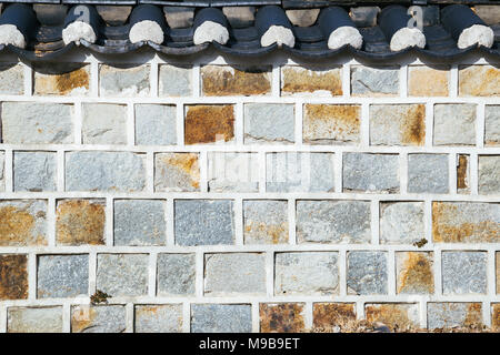 Il coreano tradizionale grigio muro di mattoni Foto Stock