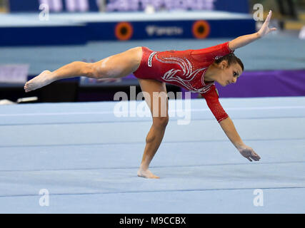 A Doha, capitale del Qatar. 24 Mar, 2018. Elisa Meneghini dell Italia comeptes durante le donne esercizi a terra in finale alla undicesima figura di ginnastica artistica dei singoli apparecchi di Coppa del Mondo a Doha, capitale del Qatar, il 24 marzo 2018. Credito: Nikku/Xinhua/Alamy Live News Foto Stock