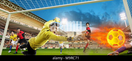 I giocatori di calcio sono giocare a calcio Foto Stock
