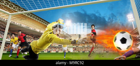 I giocatori di calcio sono giocare a calcio Foto Stock