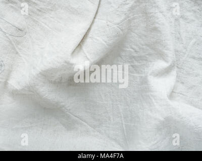 Crumpled texture tessuto di lino vintage in background. Materiale Foto Stock