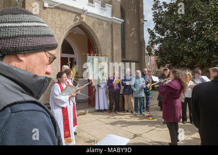 Washington DC - i membri della Chiesa di Cristo celebrato domenica delle Palme con una processione nella loro Capitol Hill quartiere prima di culto presso la chiesa. Ch Foto Stock