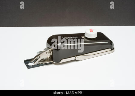 Allegato Buttonholer cantante per macchine da cucire. Foto Stock