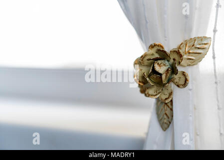 Decorativa tenda clip a forma di fiore Foto Stock