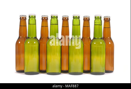 Righe di verde e marrone e le bottiglie di birra Foto Stock