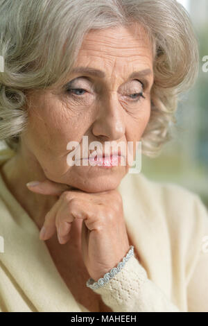 Ritratto di triste donna senior Foto Stock