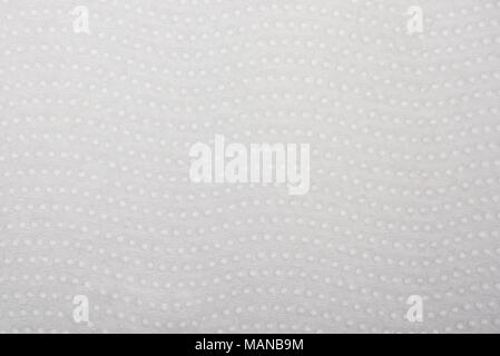 Libro bianco sullo sfondo di texture con punti close up Foto Stock